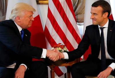هذا هو سر المصافحة "العنيفة" بين ماكرون وترمب!