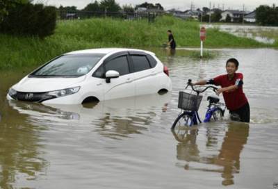 بالفيديو .. فيضانات وضحايا بـ"اليابان" ورئيس الوزراء يقطع جولته الخارجية
