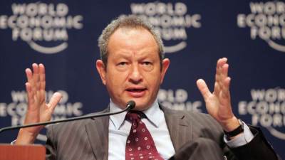 ساويرس يشارك بمشروع لتحويل وسائل النقل الخفيف للكهرباء